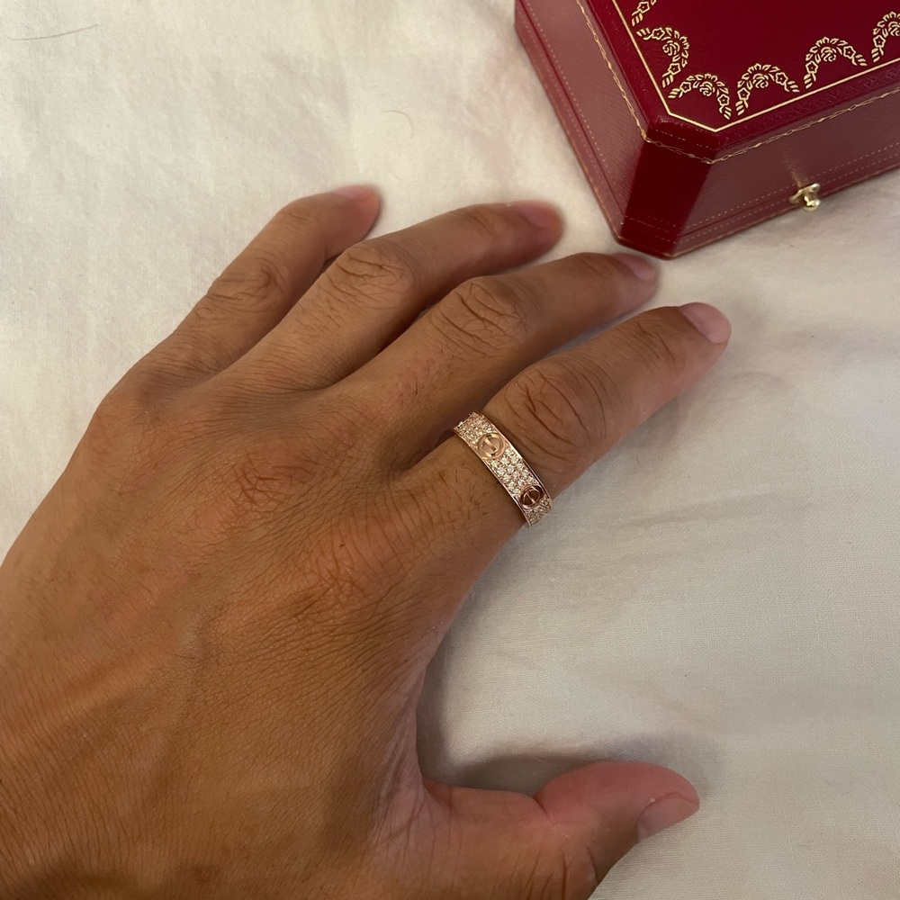 Brand new authentic with box and papers cartier love rings, diamond set by us